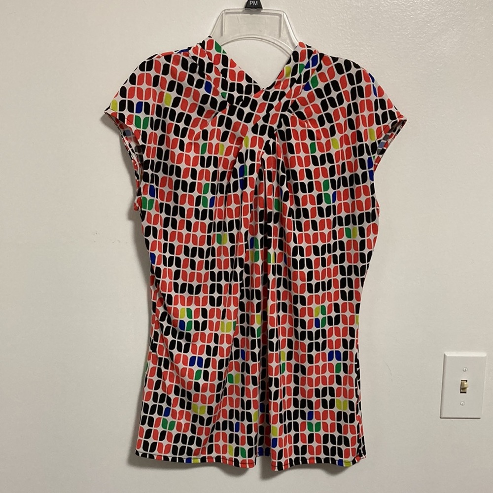 Worthington Blouse with a cute black and orange geometric design. Career
